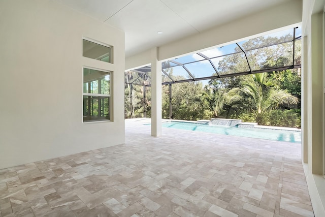 view of swimming pool with pool water feature