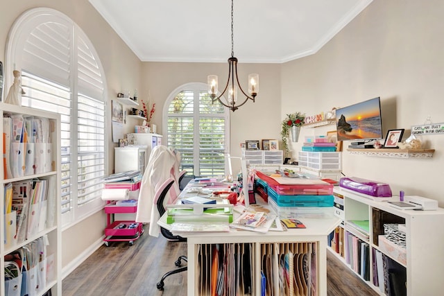 home office featuring a chandelier, wood finished floors, crown molding, and baseboards