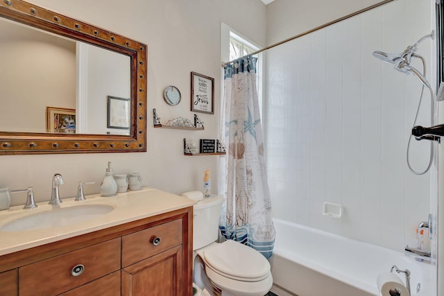 full bath featuring toilet, shower / bath combo with shower curtain, and vanity