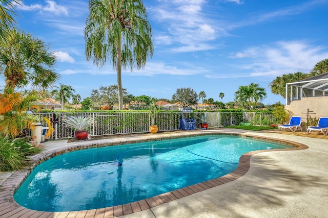 view of pool with fence