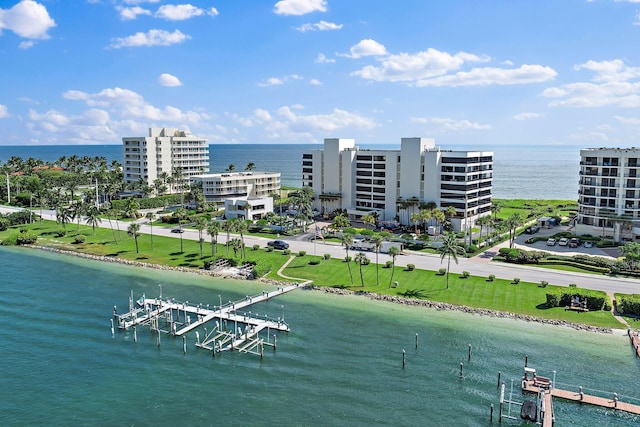 birds eye view of property featuring a water view