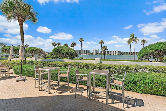 view of patio / terrace featuring a water view