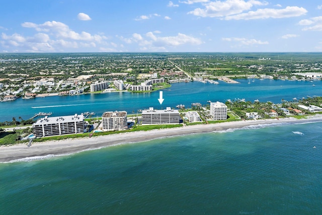 aerial view with a view of the beach and a water view