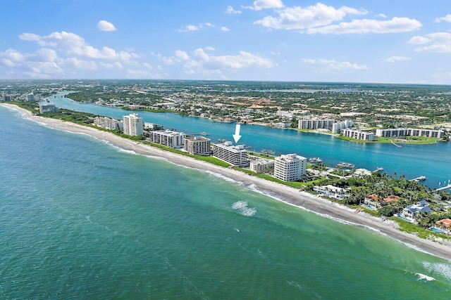 aerial view featuring a water view and a beach view