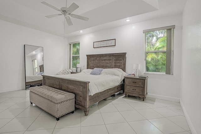 bedroom featuring light tile patterned floors and ceiling fan