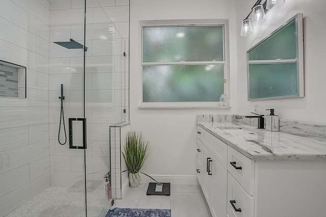 bathroom featuring vanity and walk in shower