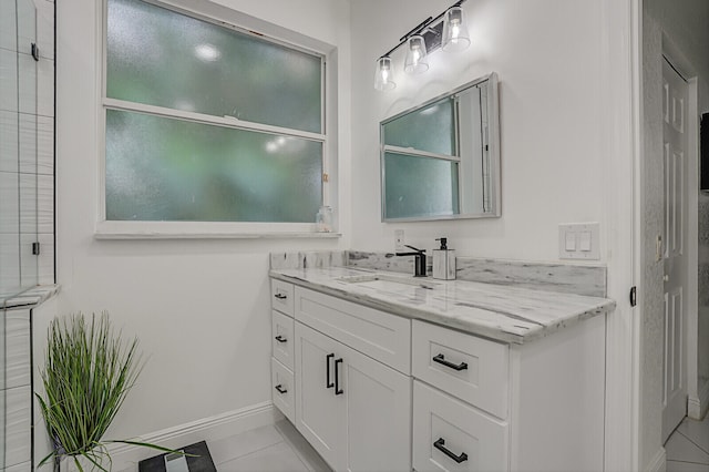 bathroom featuring vanity and tile patterned flooring