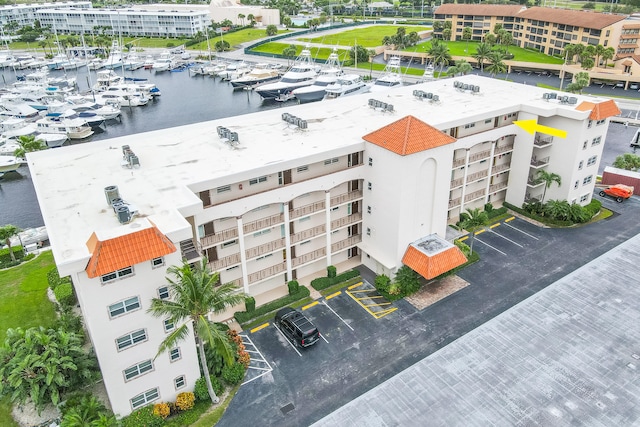 birds eye view of property featuring a water view