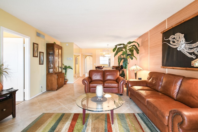 living room with light tile patterned floors