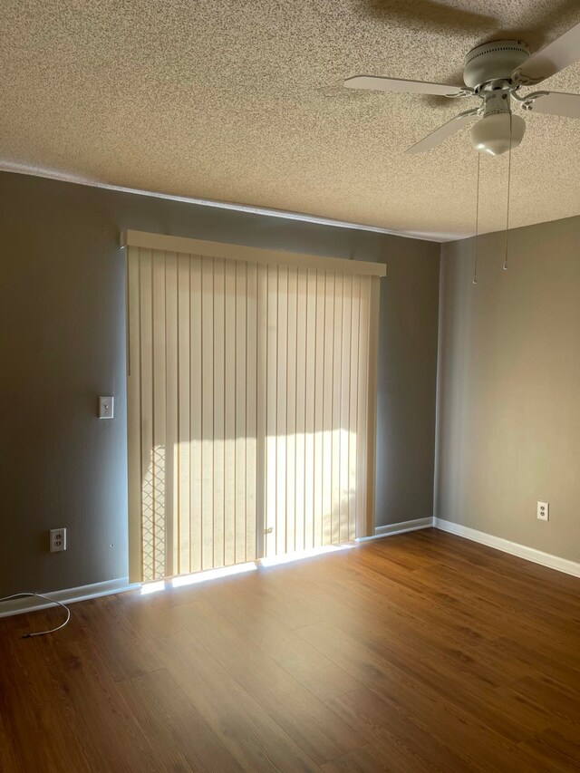 unfurnished room with hardwood / wood-style floors, a textured ceiling, and ceiling fan