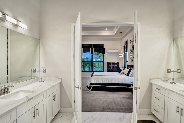 bathroom featuring an AC wall unit, vanity, ornamental molding, and a raised ceiling