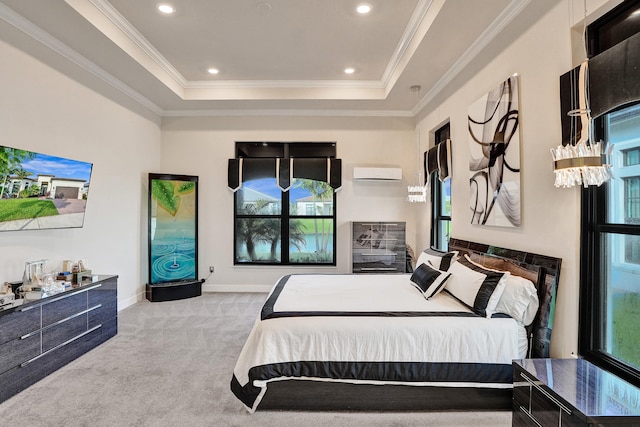 bedroom featuring light carpet, crown molding, a raised ceiling, and a wall mounted air conditioner