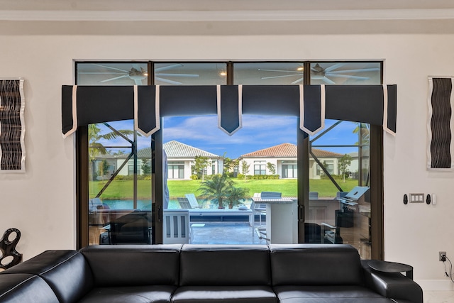 living room featuring crown molding