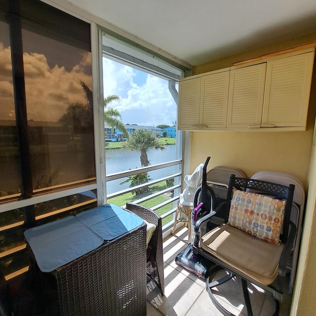 balcony featuring a water view