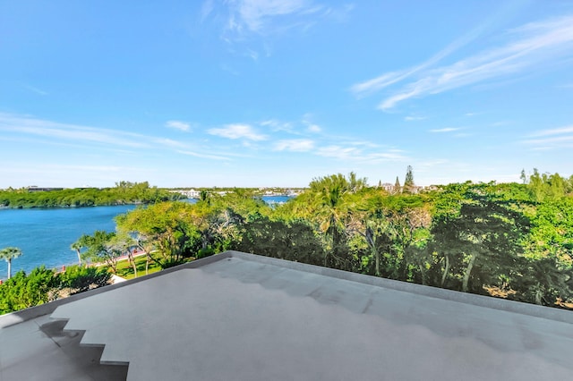 view of patio / terrace with a water view