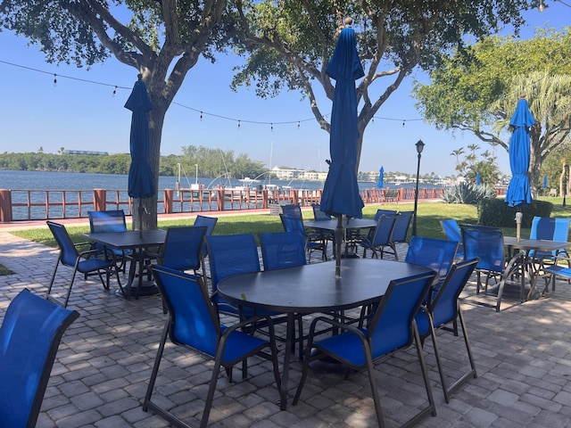 view of patio featuring a water view