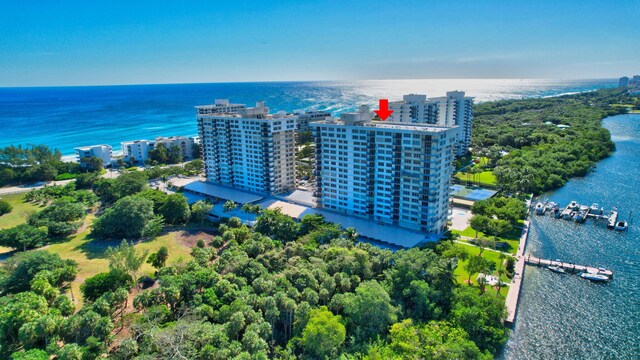 birds eye view of property featuring a water view