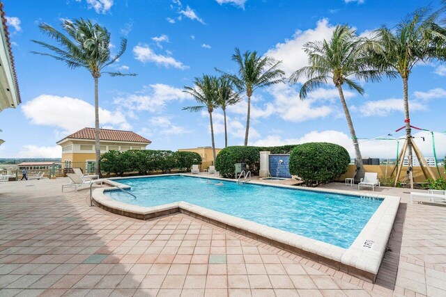 view of pool with a patio area