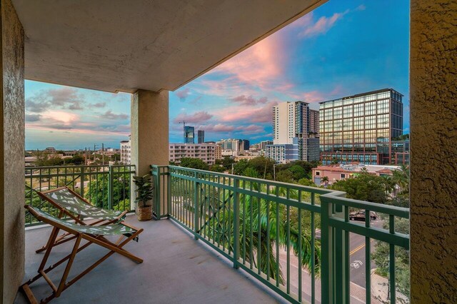 view of balcony at dusk