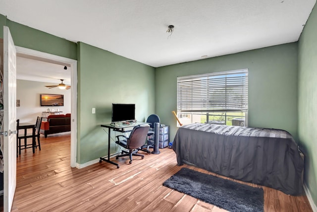 bedroom with light wood-type flooring