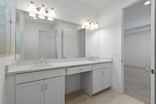 bathroom featuring vanity and hardwood / wood-style flooring