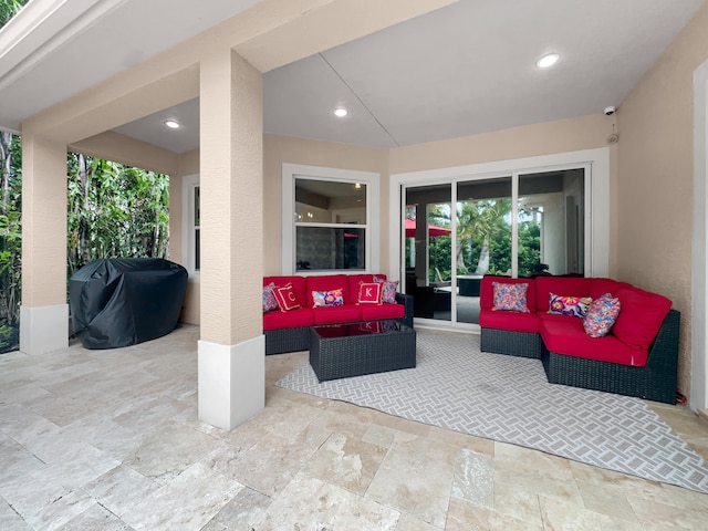 view of patio featuring an outdoor living space and grilling area