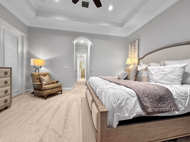 bedroom with ceiling fan, ornamental molding, and light colored carpet