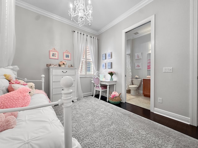 bedroom featuring connected bathroom, crown molding, wood-type flooring, and an inviting chandelier