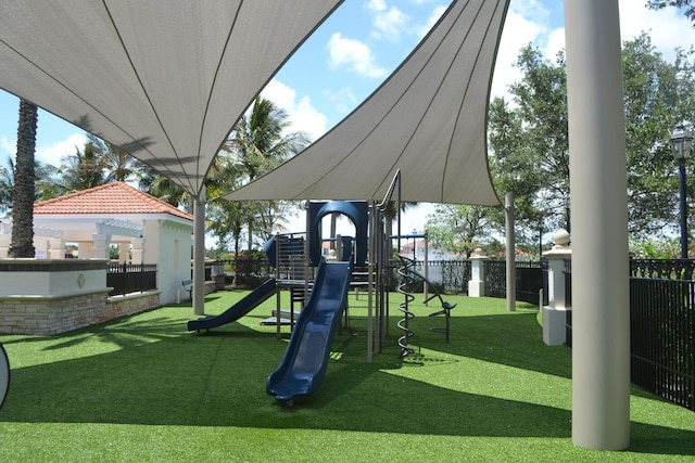 view of jungle gym featuring a yard