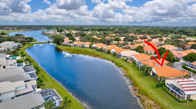 drone / aerial view with a water view