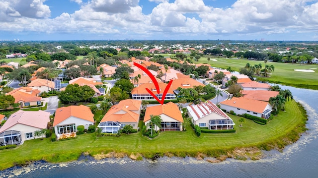 drone / aerial view with a water view