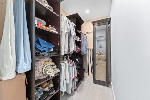 walk in closet featuring light wood-type flooring