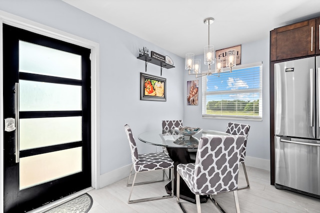 dining room featuring an inviting chandelier