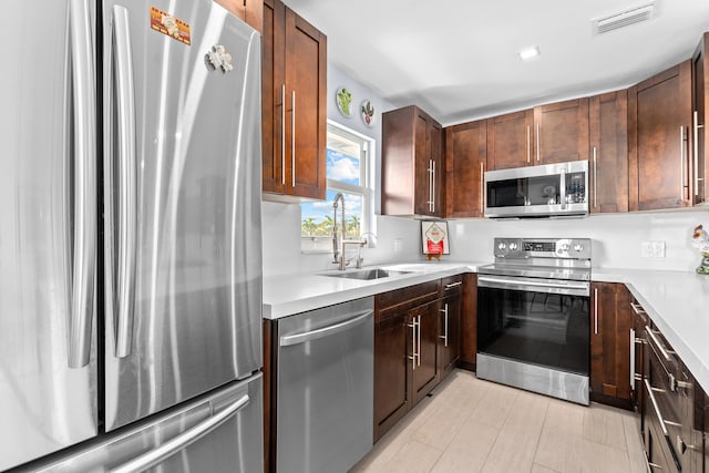 kitchen with sink and stainless steel appliances