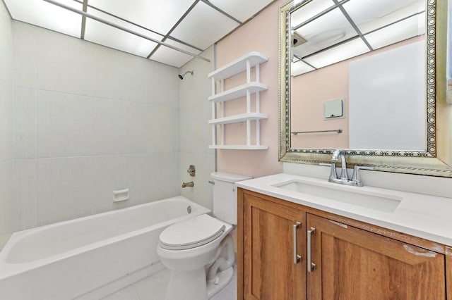 full bathroom featuring tiled shower / bath, vanity, toilet, and tile patterned flooring