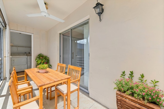 dining space featuring light tile patterned floors, separate washer and dryer, and ceiling fan