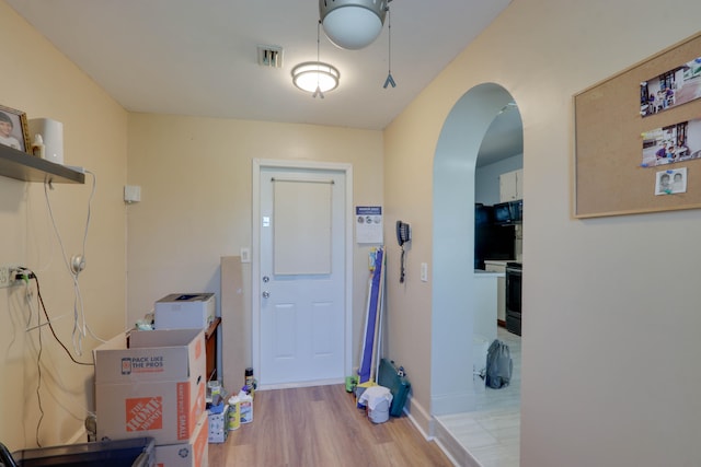 foyer with light hardwood / wood-style floors