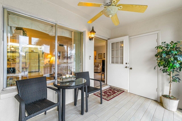 interior space featuring ceiling fan