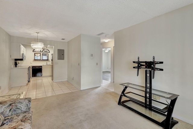 2109 SE Wayne Rd Unit 2109, Stuart, FL 34994 - unfurnished living room with a sink, a chandelier, baseboards, light carpet, and electric panel