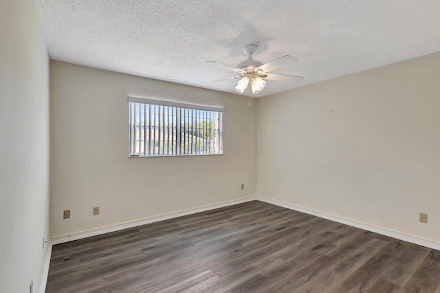 spare room featuring ceiling fan, a textured ceiling, and dark hardwood / wood-style floors