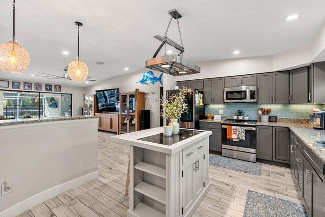 dining space with hardwood / wood-style flooring and a textured ceiling