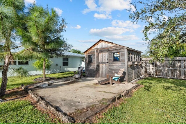 view of outdoor structure with a yard