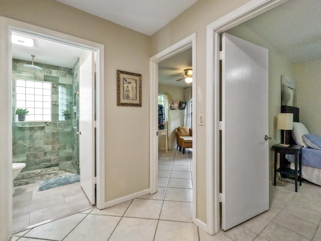 hall with light tile patterned flooring