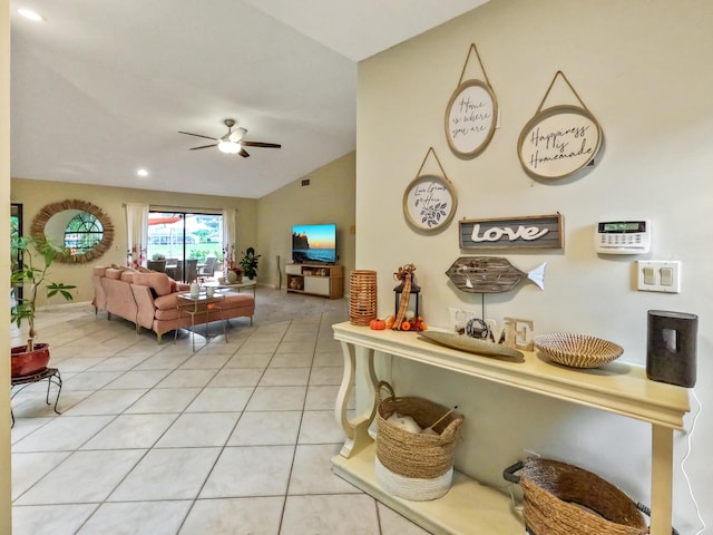 tiled living room with ceiling fan