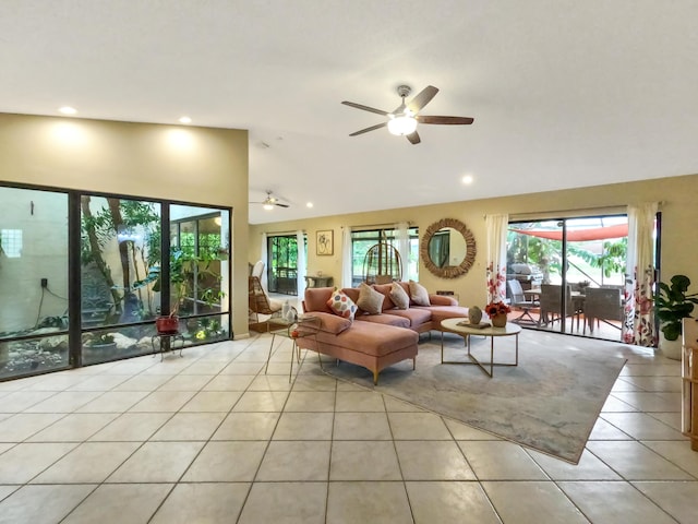 tiled living room featuring ceiling fan