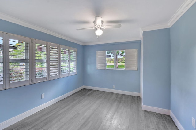 unfurnished room with crown molding, light hardwood / wood-style flooring, and ceiling fan