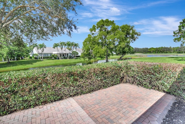 view of patio / terrace featuring a water view