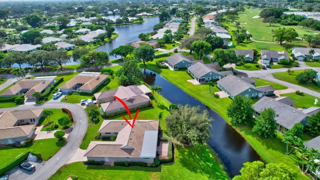 bird's eye view with a water view