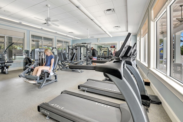 exercise room with ceiling fan