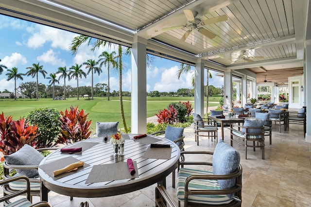 view of patio / terrace featuring ceiling fan